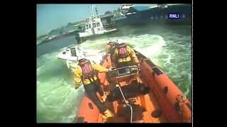 Teignmouth lifeboat crew stop out of control speedboat [upl. by Oicnecserc504]