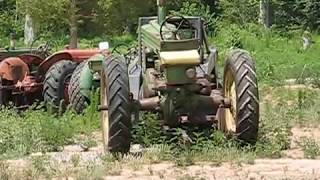 John Deere tractors moved with a frontend loader [upl. by Idnib]