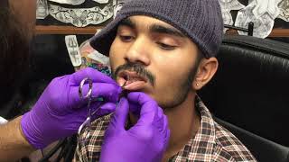 Getting Best Piercing Of Lips  Piercing  Male Lips Piercing [upl. by Aneetsirk]