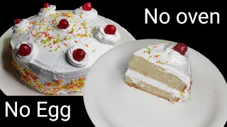 Eggless Vanilla sponge cake without oven in telugu New year cake Moist Eggless vanilla cake recipe [upl. by Manvell]