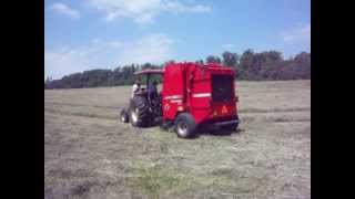 Baling Hay with a Hesston 1745 Baler [upl. by Ynnol]