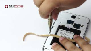 Phone Doctors Tech Tips  How to remove a stripped screw with a rubber band [upl. by Ijnek488]