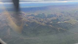 Dunedin flight view Breathtaking view of the mountains clouds lakes animals amp amazing nature [upl. by Kcirred563]