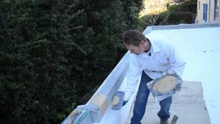 Apply a smooth stucco finish to parapet caps [upl. by Sirap901]