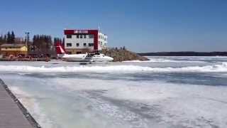 Air Tindi ski plane takes off from the spring ice on Yellowknife Bay [upl. by Roda189]