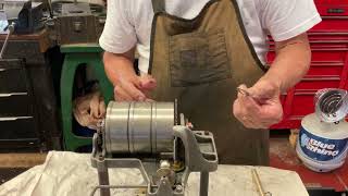 1925 Using a brass rod to chase the spring barrel shaft a bronze washer takes up slack [upl. by Wehtta]