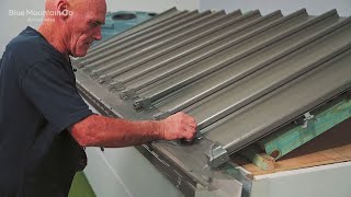 How to Install Steel Gutter Mesh on a KlipLok® roof  Roof Edge with Saddles [upl. by Alrick765]