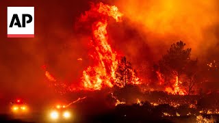 Californias largest wildfire explodes in size as fires rage across US West [upl. by Nalat]