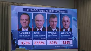 Screen shows Putin expected to get 8785 of vote in Russian election  AFP [upl. by Nner]