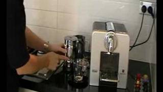 Delonghi Nespresso Coffee Machine Le Cube 185 Demo [upl. by Rhine445]