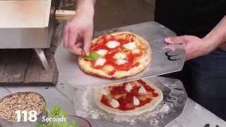 Uuni 2 2015 Pizza in 118 Seconds  Ooni Pizza Ovens [upl. by Ellerrehs]