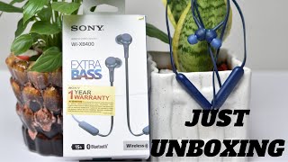 Sony WIXB400 Wireless Stereo Headset or Bluetooth Earphone Unboxing amp Physical Overview [upl. by Derzon]