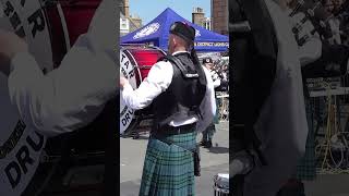 Tenor drummers mallets spin as Dunnottar Pipe and Drums play Loch Lomond at Stonehaven shorts [upl. by Mair]