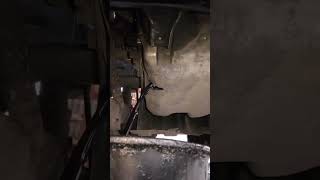 Draining the engine oil in a diesel car [upl. by Aisorbma229]