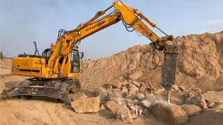 Incredible Hyundai Wheel Excavator Breaking Open Stones [upl. by Dyrraj76]