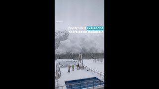 Massive controlled avalanche sweeps down mountain in Terskol Russia [upl. by Fayina740]