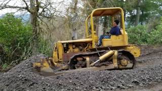 Caterpillar D4 7U dozer pushing gravel [upl. by Adiell332]