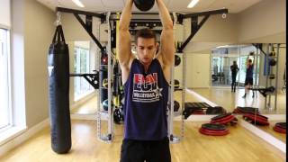 How to Perform a Single Kettlebell Thruster [upl. by Yokum149]