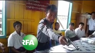 Gunwaving police officer goes viral in Myanmar [upl. by Nova465]