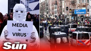 Thousands of antilockdown protesters march in Amsterdam [upl. by Osswald]