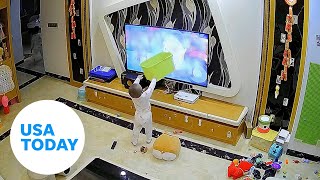 Toddler smashes TV screen after mistaking show for an interactive game  USA TODAY [upl. by Llertnod]