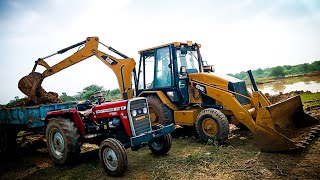 cat machine loding tractor Massey Ferguson [upl. by Siurad]