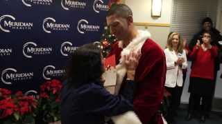 Soldier Dressed As Santa Surprises Mom Nurse At Hospital With Early Homecoming [upl. by Cirdek]