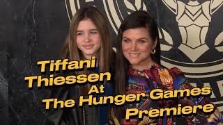 Tiffani Thiessen Stuns at The Hunger Games Premiere with Daughter Harper [upl. by Annaes930]