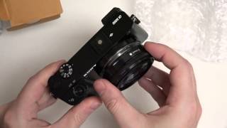 Sony SEL20F28 Emount Lens Unboxing and First Look [upl. by Nabalas]