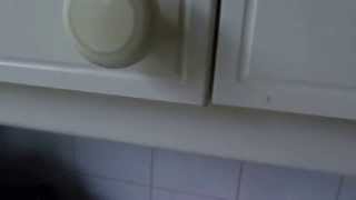 How to realign kitchen cupboard doors that have dropped out of line [upl. by Phip]