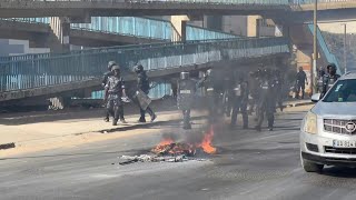 Protesters build barricades in Dakar as clashes follow Senegal election postponement  AFP [upl. by Malone]