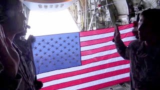 InFlight Reenlistment Ceremony Aboard HC130 Hercules [upl. by Petulah]