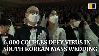 In sickness and health 6000 couples wed at church event in South Korea despite coronavirus outbre [upl. by Granlund]