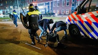 The Netherlands Fresh clashes break out between anticurfew protesters and police [upl. by Doownelg]