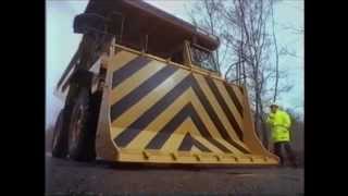 Leverton Caterpillar Demonstrator Tom Aspin in CAT 771  Volvo 440 advert [upl. by Aniweta]