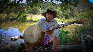 playing a GIANT GOURD BANJO by Malibu Creek [upl. by Ayahsal]