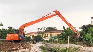 HITACHI excavators excavate soil and rocks on river embankments dump truck excavators work [upl. by Maillil]