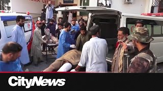 Dozens killed in Pakistan train station bombing [upl. by Hartzel500]