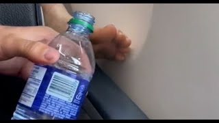 CAUGHT ON CAMERA Bare foot on plane armrest gets soaked [upl. by Amaral]