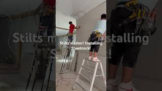 Stilts master Installing Sheetrockcontractor sheetrock stilts construction sheetrock [upl. by Terrye]