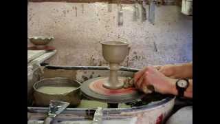 Throwing a clay pottery goblet on a potters wheel demonstration how to pot throw make [upl. by Lagas518]