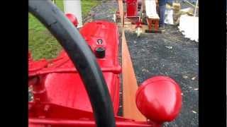 1942 Multifuel Farmall H tractor operating hammer mill [upl. by Backler]