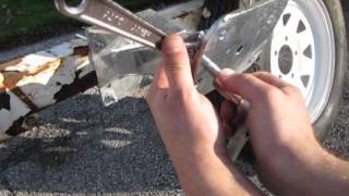 How To Install Marine Spare Tire Carrier on a Boat Trailer From RecStuffcom [upl. by Gabriel]