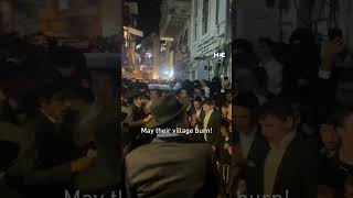 Ultraorthodox Jews sing and cheer as they burn Palestinian flags in Jerusalem neighbourhood [upl. by Erminia]