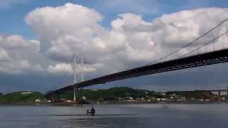 Boat Sailing Under Forth Road Bridge Firth Of Forth Scotland [upl. by Allemat]