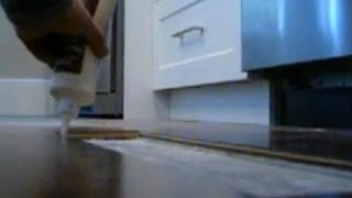 How to Repair Hardwood Floor Glue Down Installation Mryoucandoityourself [upl. by Asfah295]