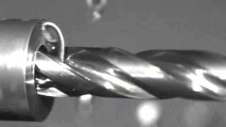 OSG EXOPRO® Mega Muscle® Chip Evacuation in Slow Motion  Drilling 1045 Carbon Steel [upl. by Hanshaw]