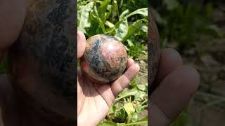 Polished rhodonite sphere afghanistan afghanite quartz afghanjewelry crystals gems gemstones [upl. by Tati367]