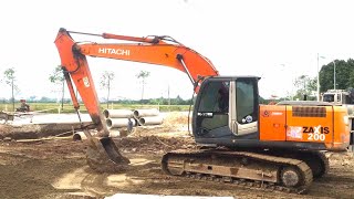 HITACHI excavators shovel soil dump truck excavators work at the construction site [upl. by Haskel]