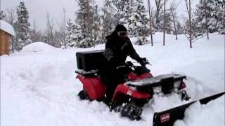 ATV Plowing 3 Feet of Snow Kawasaki Prairie 400 [upl. by Garek]